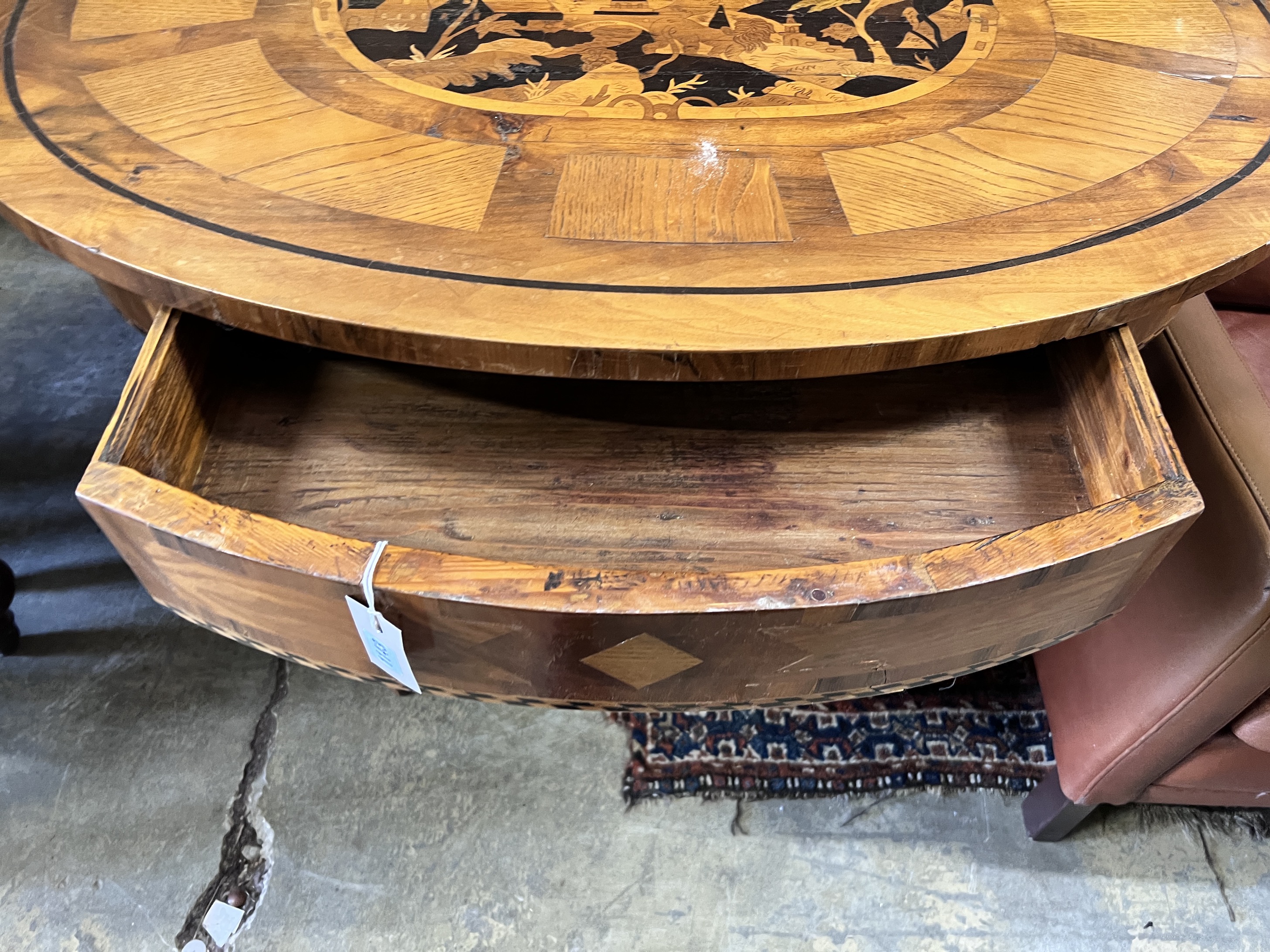 A 19th century Continental marquetry inlaid centre table with frieze drawer, width 103cm